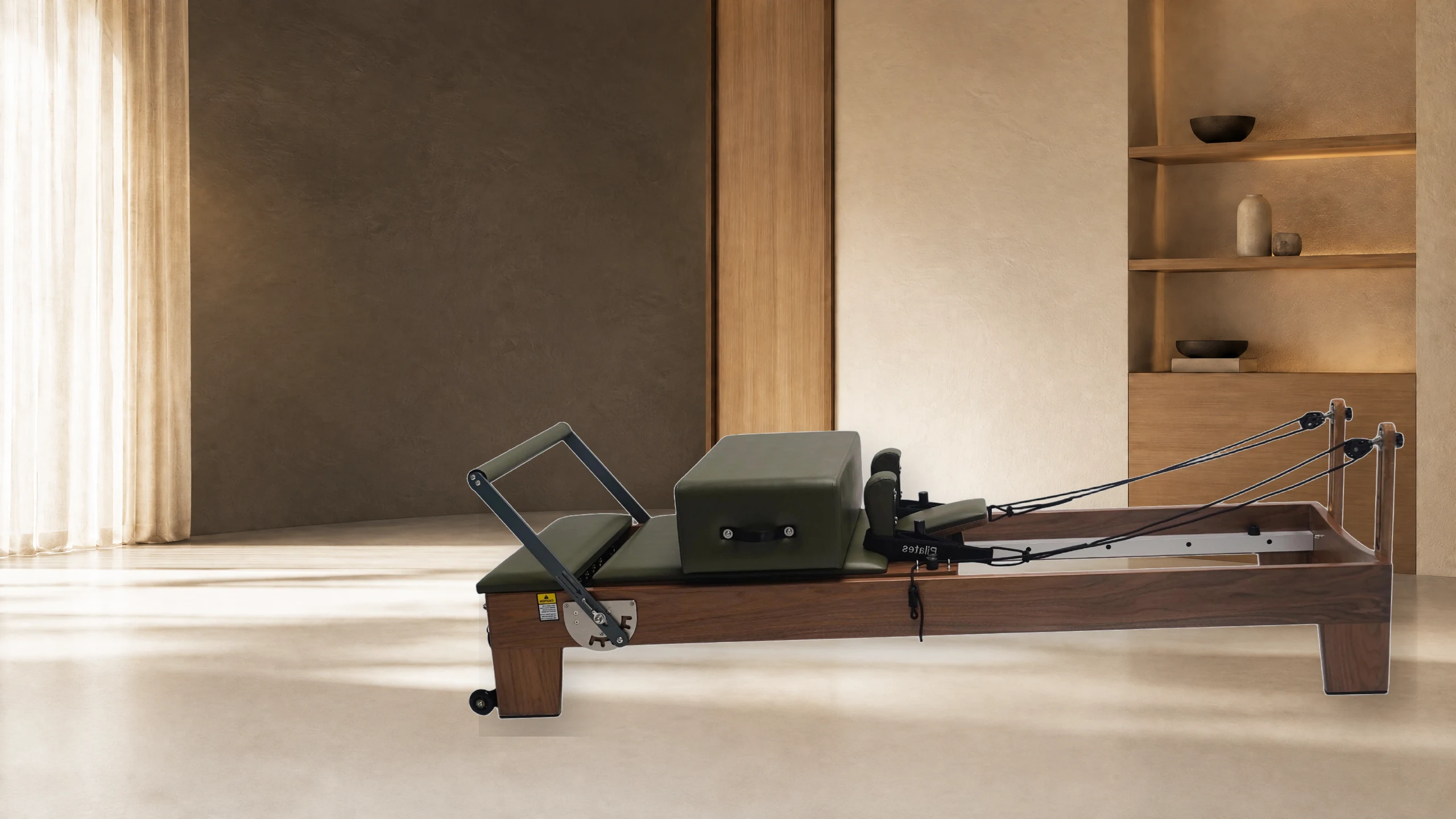 Catalog-verified A015 walnut Reformer in a commercial Pilates studio setting